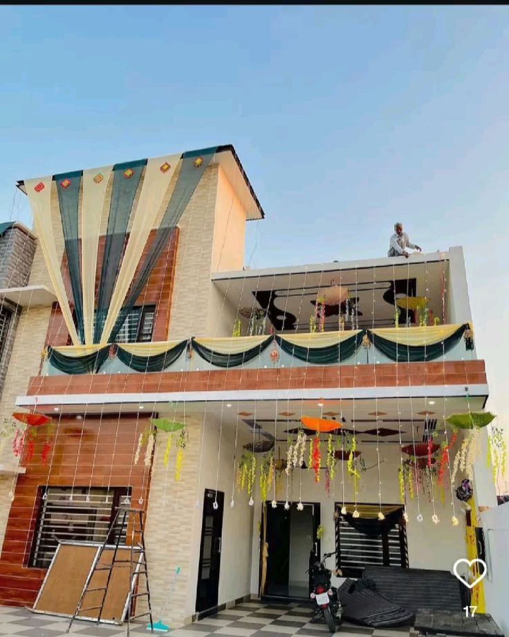 House facade with hanging flower strings