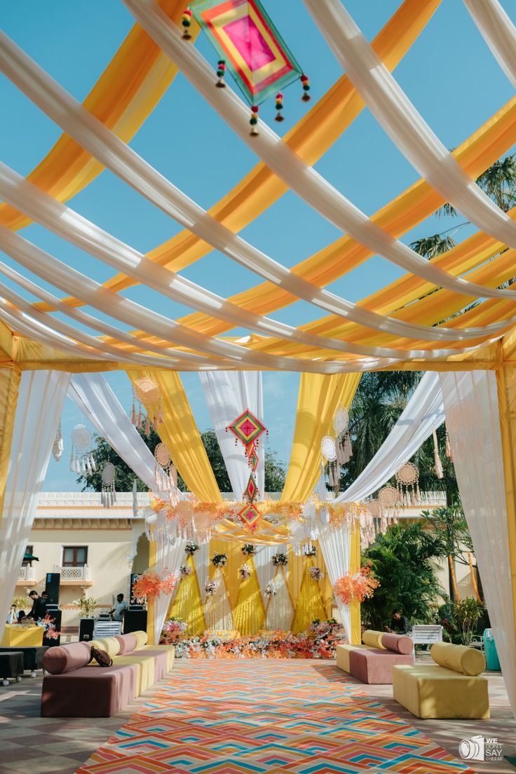 Yellow and white draped canopy walkway